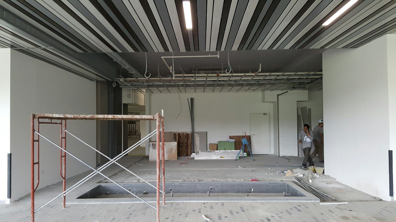 Commercial interior under renovation with scaffolding (stock image)